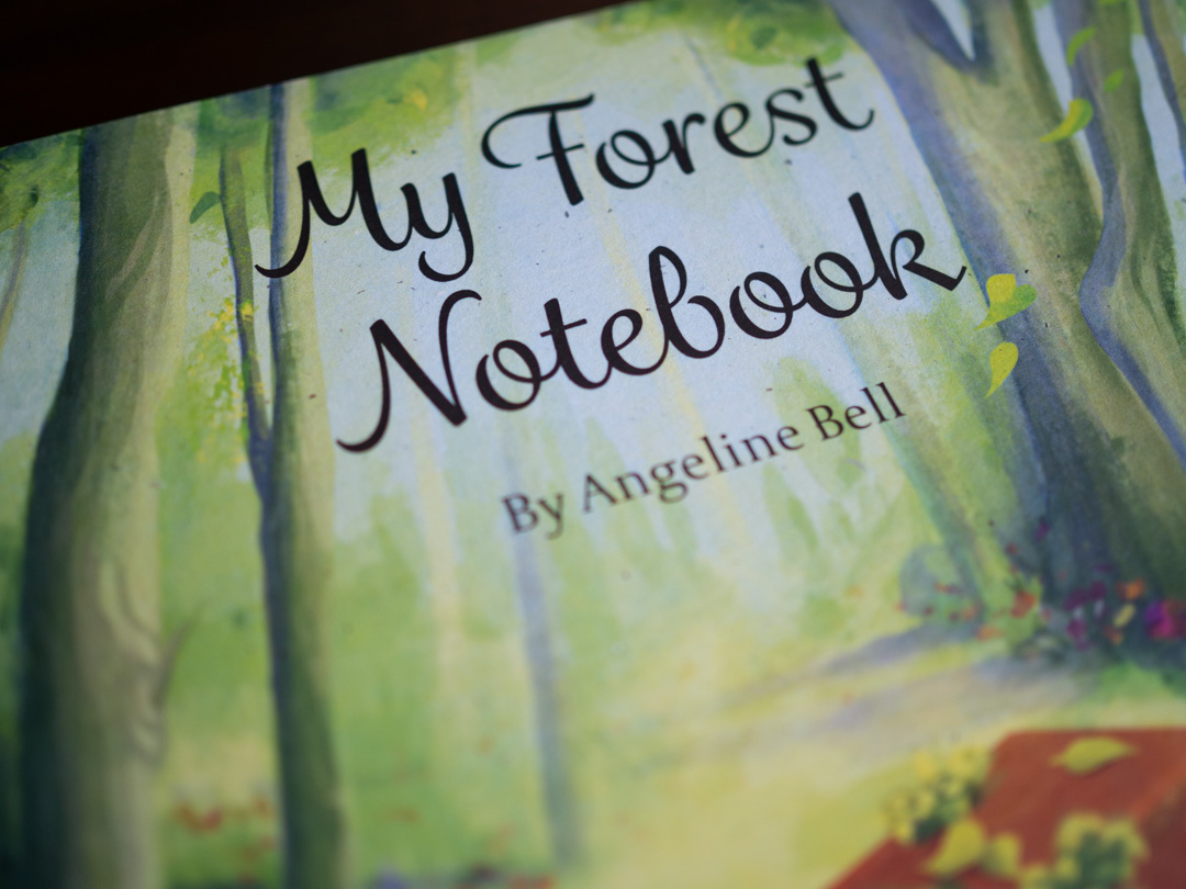 Front cover of My Forest Notebook by Angeline Bell, a collection of nature-inspired piano pieces
