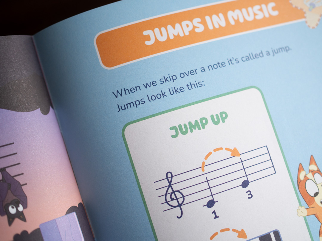 Activity page from Bluey: First Ever Piano Book introducing the concept of musical skips and steps through colourful illustrations.
